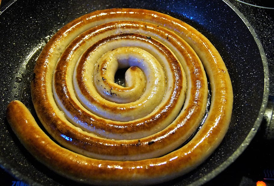 When I googled "debt spiral", this royalty free image of a sausage came up.